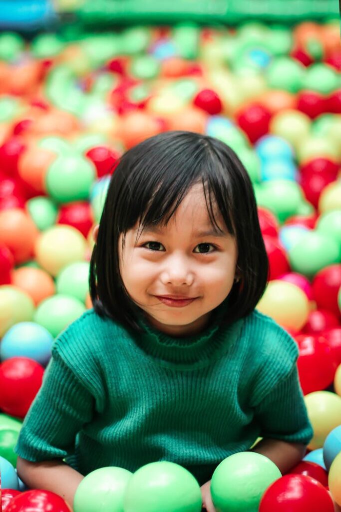 Girl Wearing Green Knit Shirt